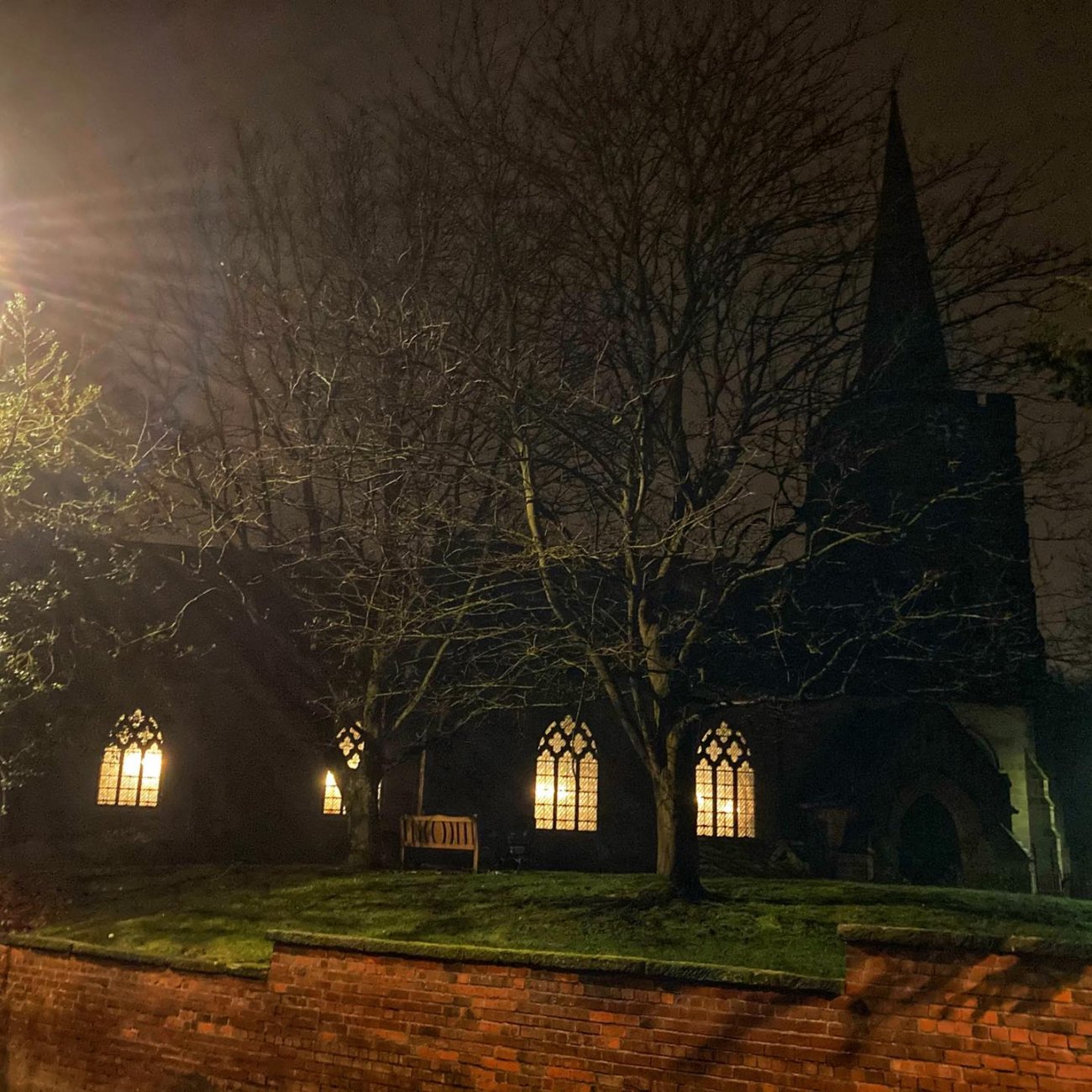 Photograph of St Werburgh's at night